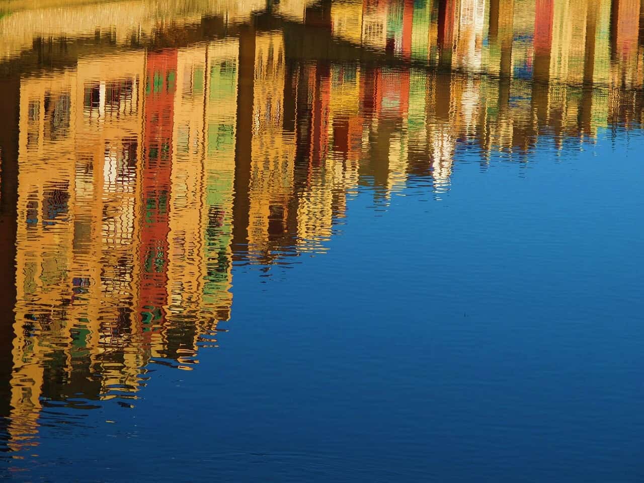 building reflected in water